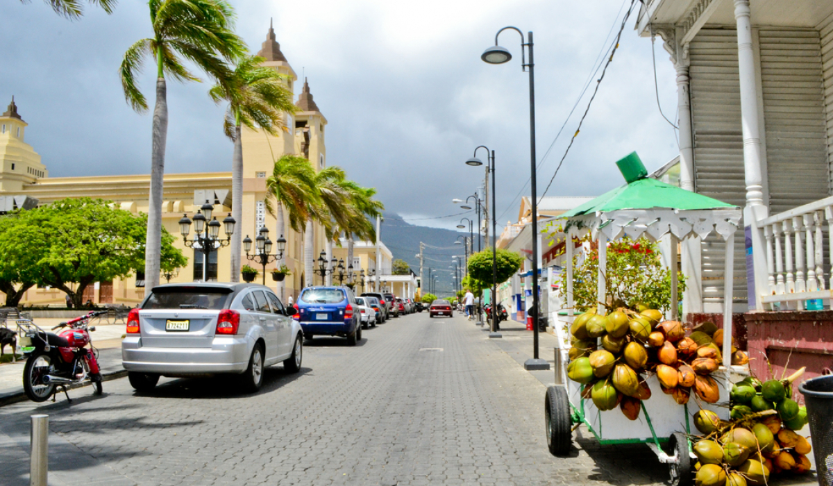 Central Park streets and some coconut vendor at the side  - Marysol Tours - Puerto Plata City Tour